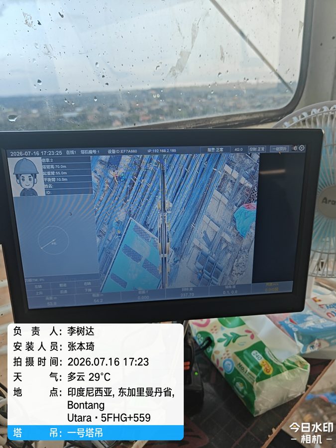 In-cab display showing live site video and crane monitoring data